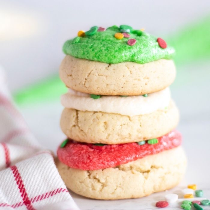 christmas lofthouse cookies stacked on top of each other
