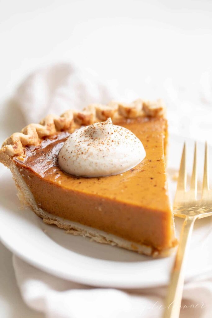 eggnog whipped cream on apumpkin pie 