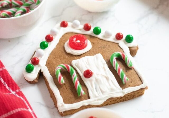 decorating gingerbread cookie house