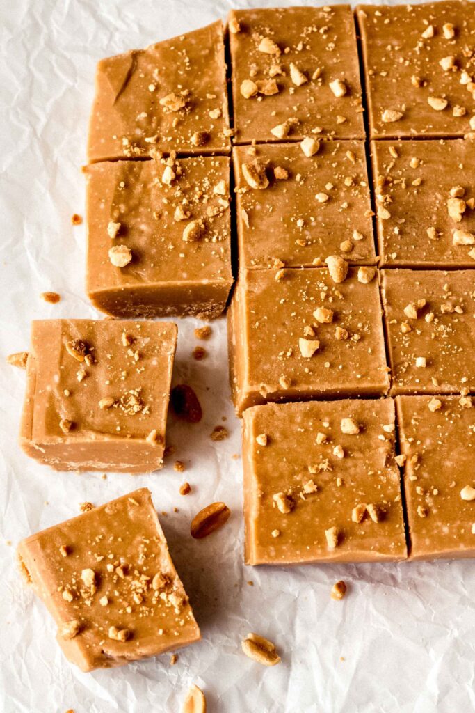 keto fudge on a table cut into pieces 
