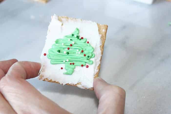 frosted graham cracker with christmas tree