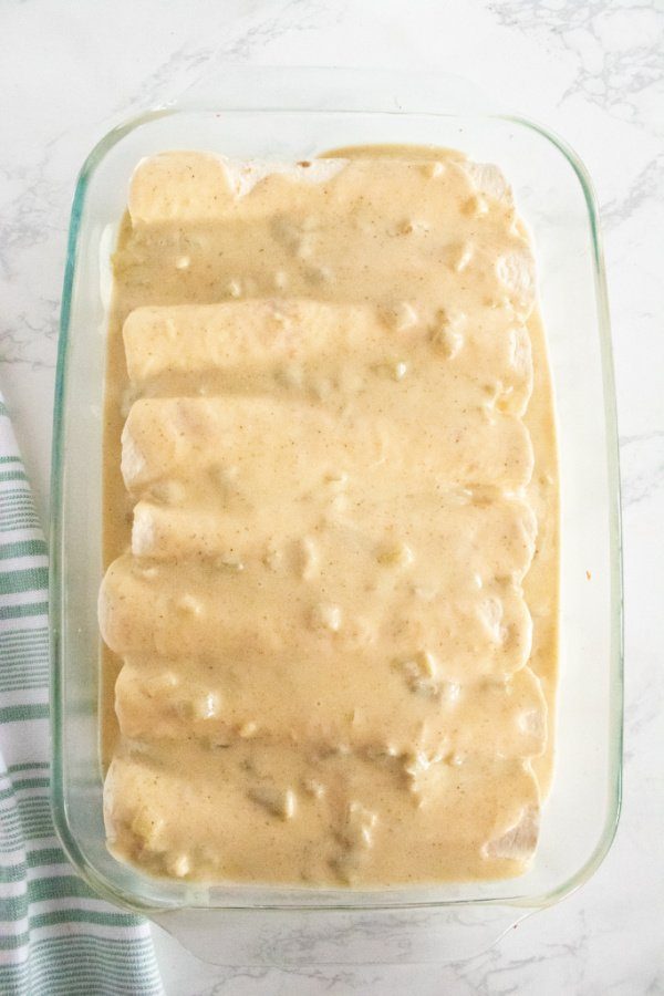 tortillas with a sour cream sauce poured over the top