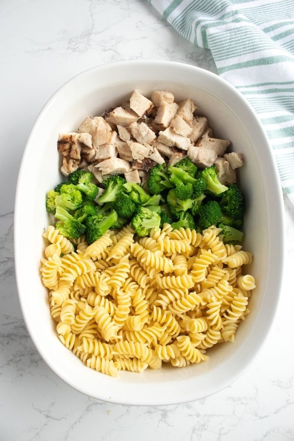 chicken, broccoli and pasta is a baking dish 