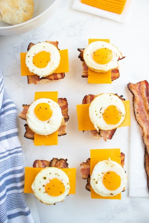 egg breakfast sandwiches placed on a table 