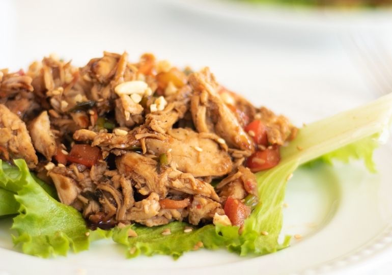 chicken lettuce wrap on a plate