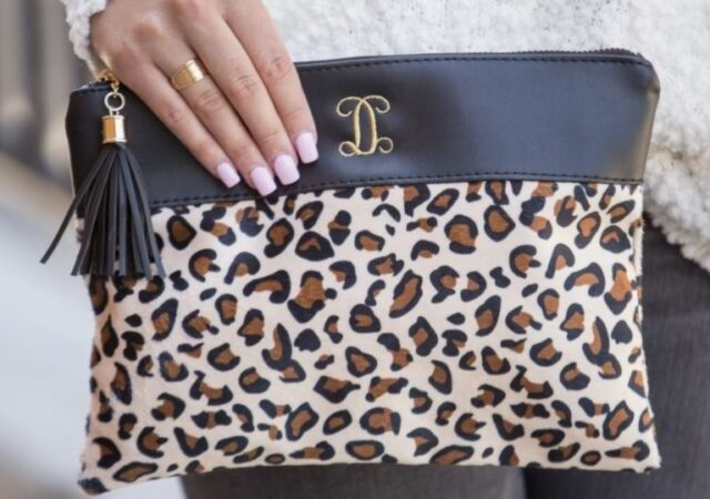 Monogrammed Leopard Pouch on Sale - woman holding pouch