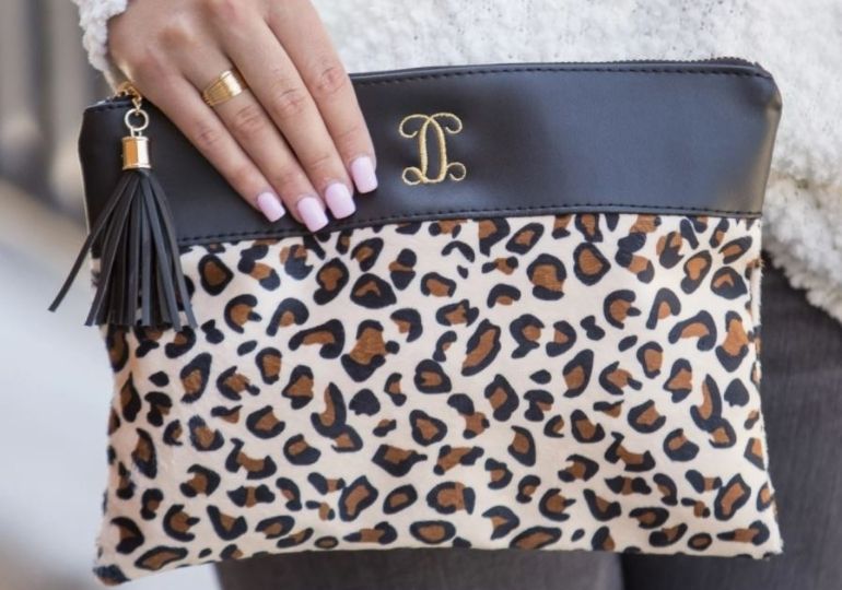 Monogrammed Leopard Pouch on Sale - woman holding pouch