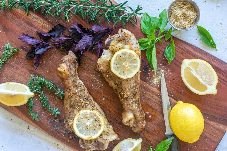 turkey legs on cutting board 