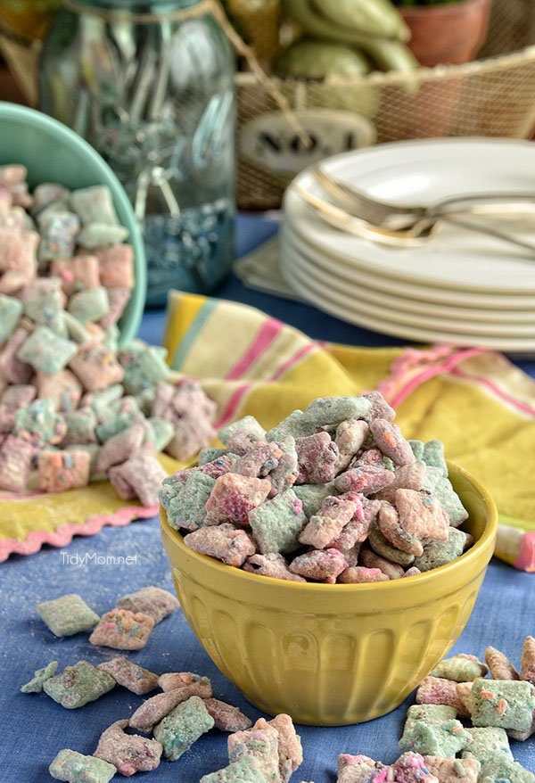 cake batter puppy chow in a yellow bowl