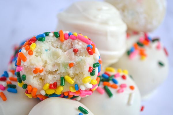 cake bites with a bite taken out of one 