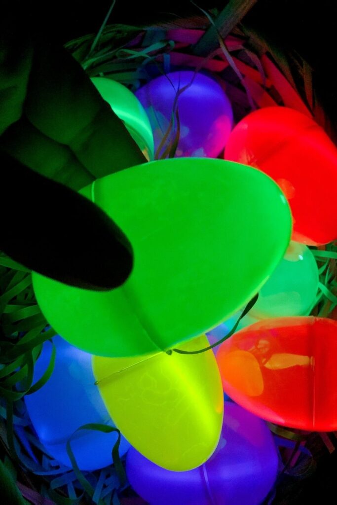 holding a glow in the dark egg