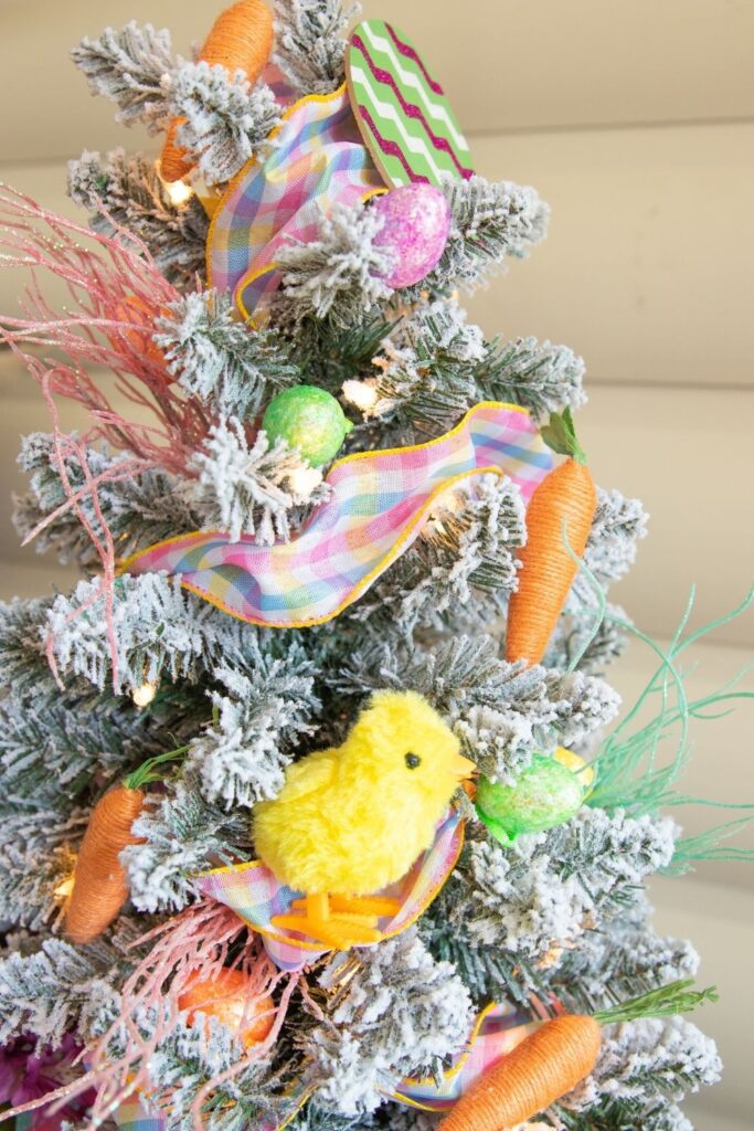 Check out this Dollar Tree Easter Tree! You will decorate an indoor tree with festive and fun Easter decor found at the Dollar Tree! #easter #passion4savings #tree #homedecor #dollartree #easy #affordable #budget #homedecor #best #dollarstore how to decorate for easter (1)