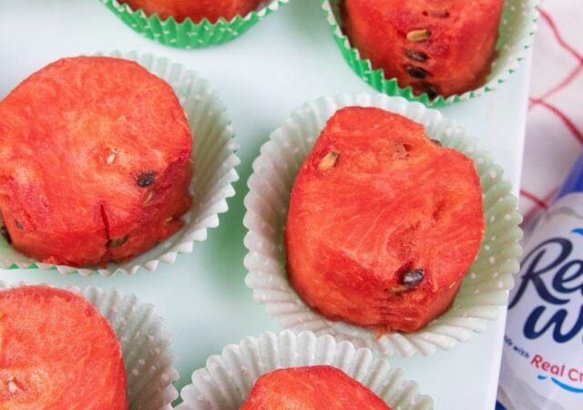 sliced watermelon pizza on table