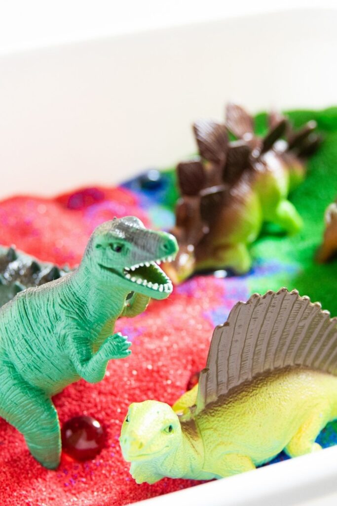 Dinosaur Sensory Bin is a fun and creative sensory bin for kids. This is a fun and easy dinosaur activity for kids you will want to try. #passion4savings #diy #activity #sensory #sensorybin #diyforkds #kids #fun #indoor #sensory how to make sensory bin