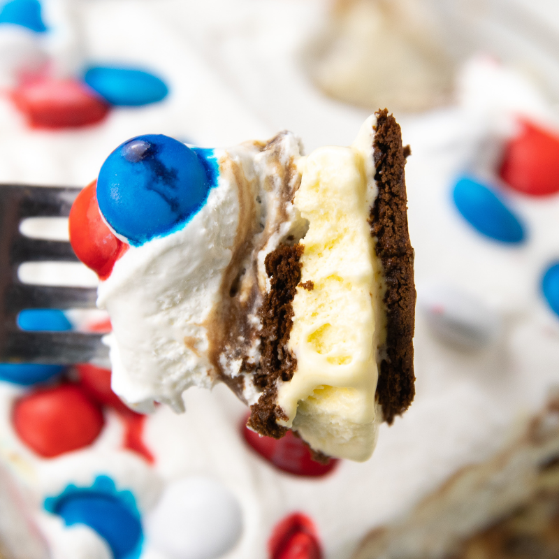 4th of July Ice Cream Sandwich Cake is an easy no bake summer dessert made with ice cream sandwiches. A simple 4th of July dessert! #4thofjuly #passion4savings #easy #nobake #dessert #summer #memorialday #patriotic #5minute #layeredtreat ice cream dessert