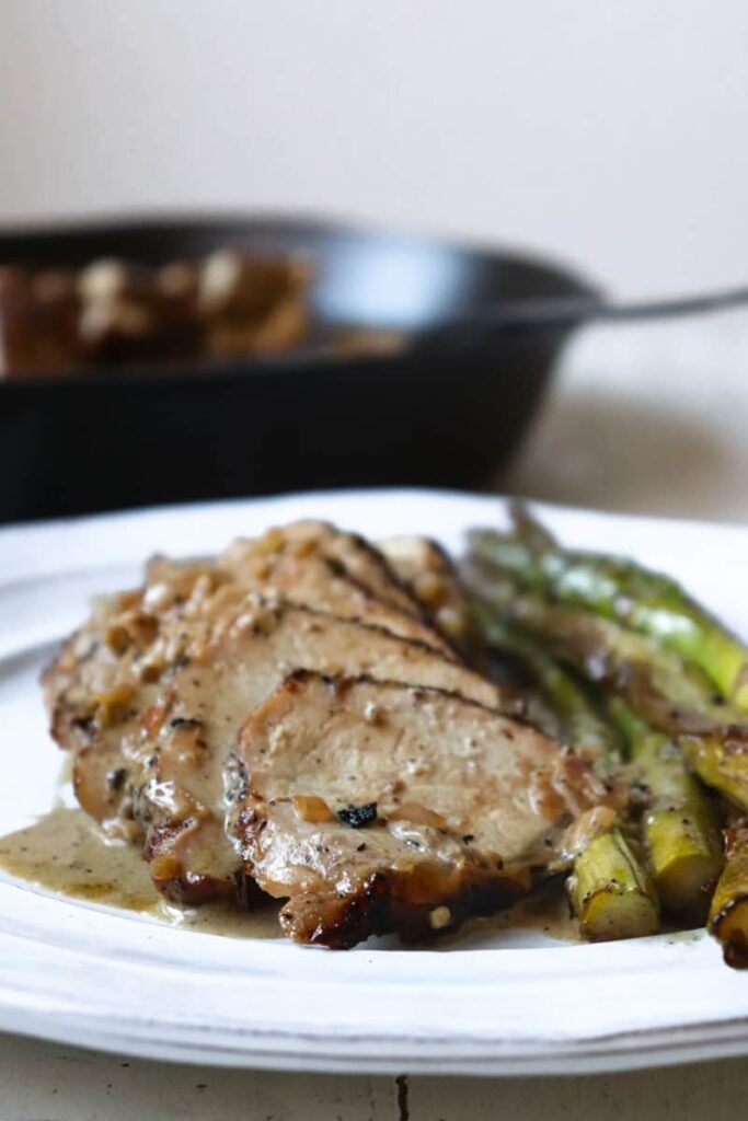 pork tenderloin sliced on plate 