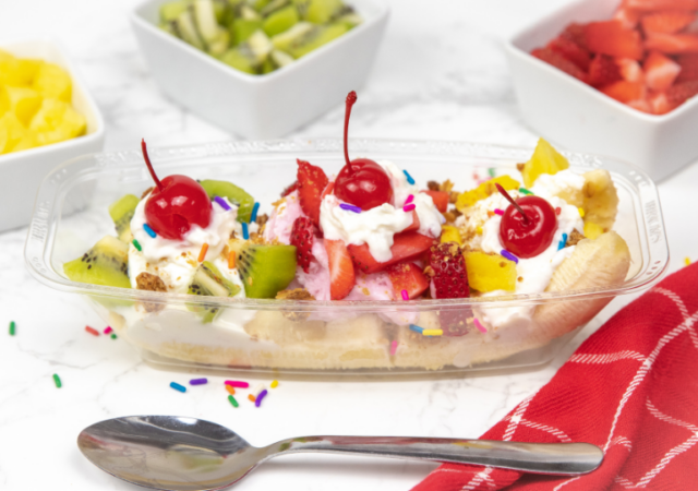 yogurt banana split on table with spoon