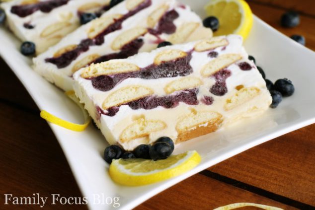 lemon and blueberry ice box cake sliced on plate 