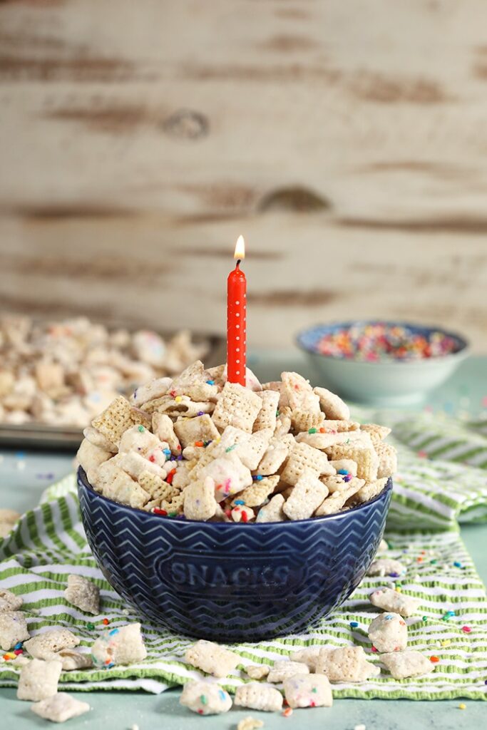 birthday party puppy chow in bowl with candle 