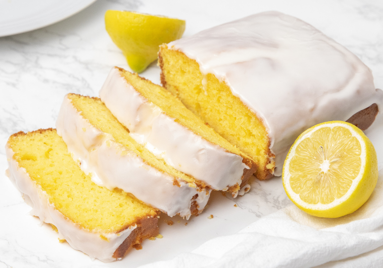 sliced lemon bread on marble counter