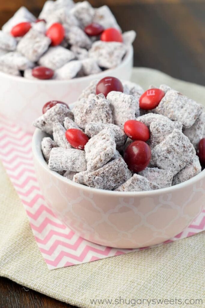 chocolate cherry snack mix in a bowl on table 