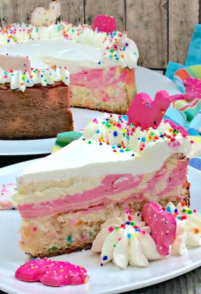 easy layered cheesecake sliced on plate