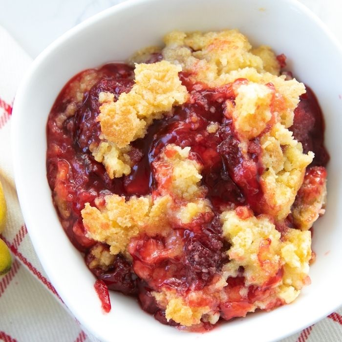 strawberry lemon dump cake in a bowl 