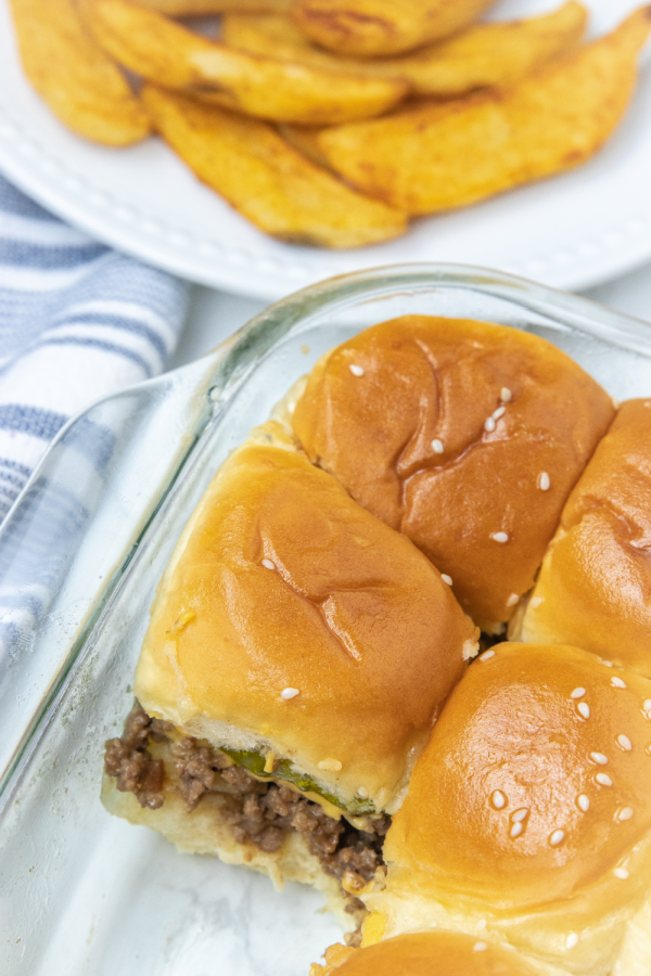 sliders in 9x13 pan with one removed from pan 