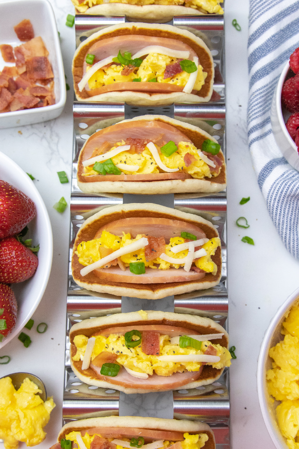 Pancake breakfast tacos are an easy and delicious way to kickstart your day. These pancakes tacos are so simple to make and delicious. #passion4savings #tacos #breakfast #recipe #easy #simple #quick #pancake #frozenpancakes easy tacos for breakfast