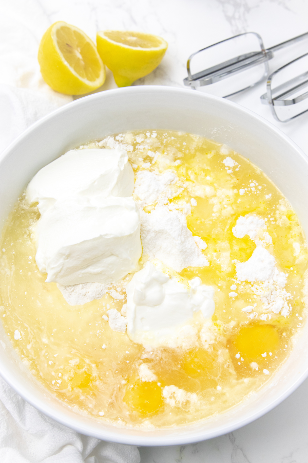 Starbucks copycat lemon bread is a delicious lemon bread with a homemade 2 ingredient lemon glaze. A Starbucks recipe to make at home. #passion4savings #lemon #bread #lemonloaf #lemonbread #lemonglaze #starbucks #copycat #recipe lemon bread ingredients in bowl