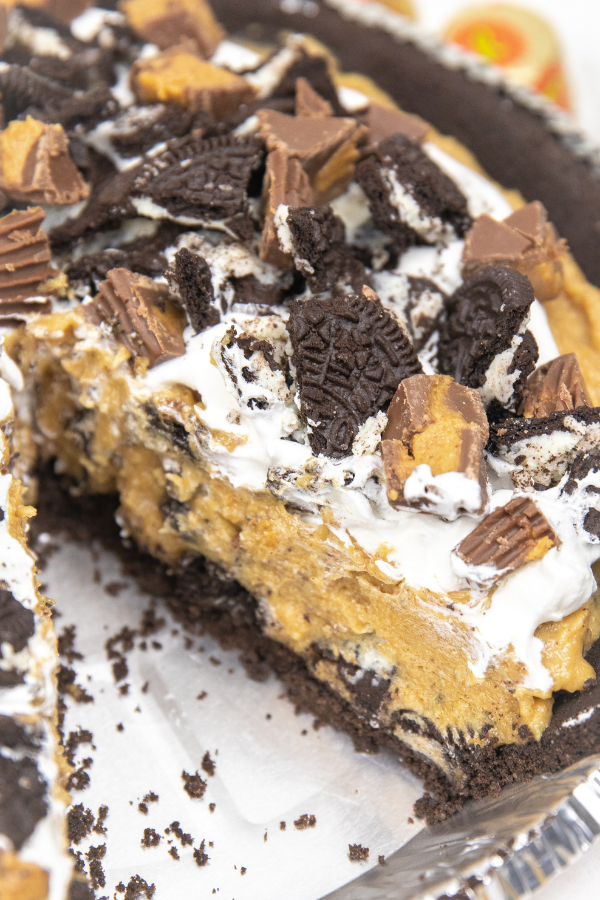 peanut butter cheesecake with slice taken out