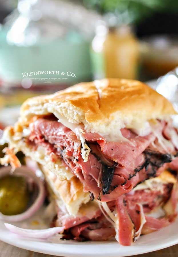 loaded pastrami sandwich on plate 