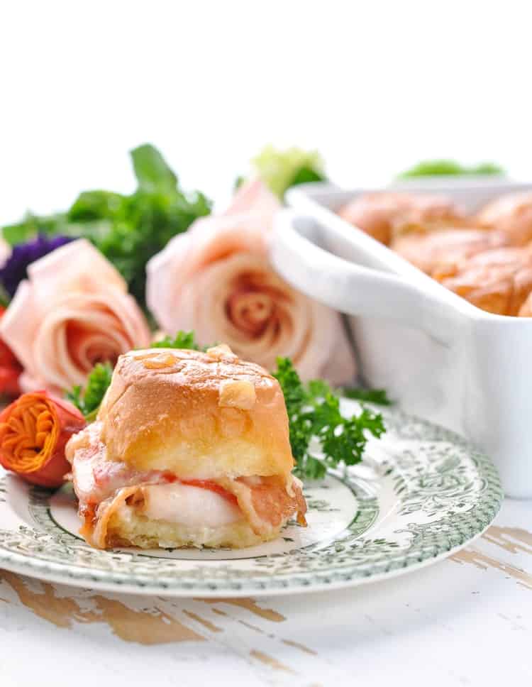 cheesy slider on a glass plate 