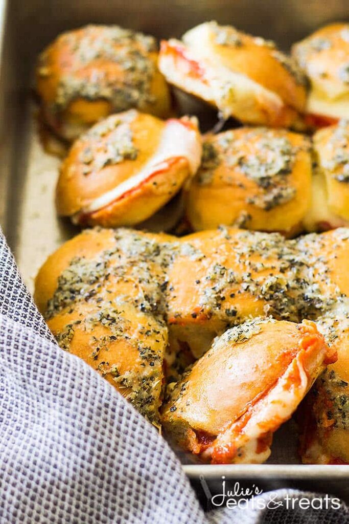 Serve up one or more of these Genius slider recipes. A simple slider bun that is filled with all your favorite fixings and baked to perfection! #passion4savings #sliders #easy #appetizer #dinner #simple #quick #nofuss