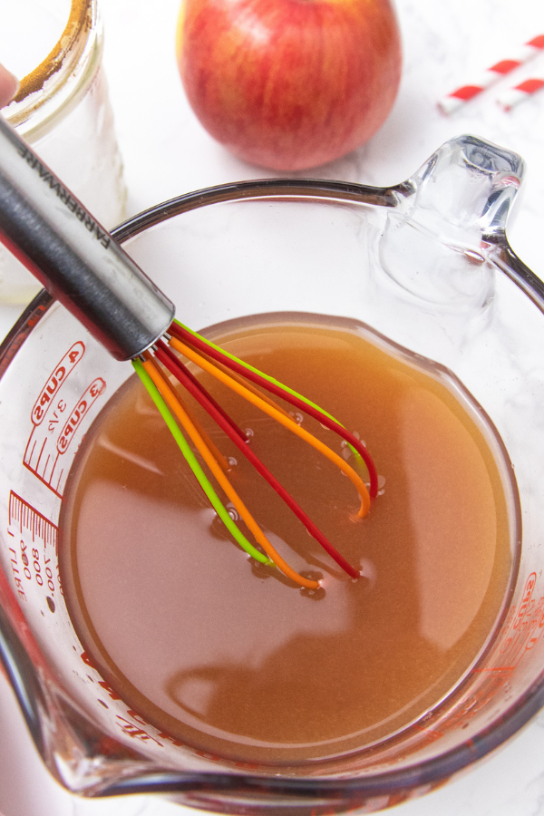 Apple Cider Punch is a refreshing and easy fall punch recipe the whole family can enjoy. A fizzy sweet apple cider drink recipe to try! #passion4savings #fall #drink #punch #family #kidfriendly #apple #applecider #drink #easy #quick mixing up an apple cider punch