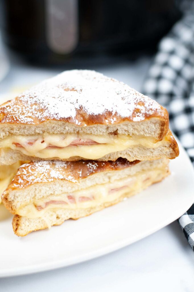 sliced monte cristo sandwich on a plate 