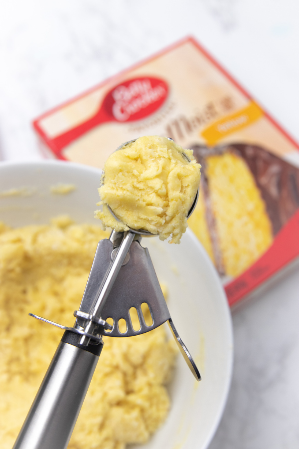 cookie scoop with cookie batter in it