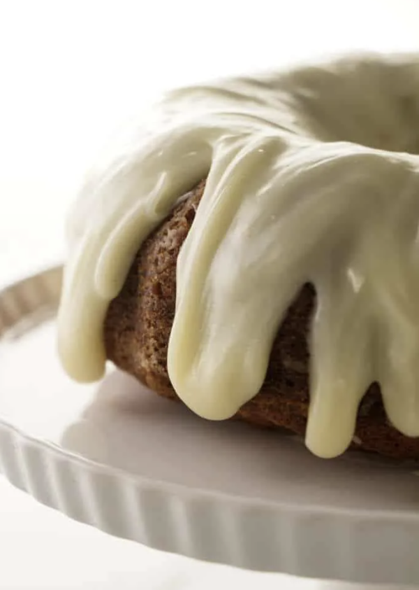 banana cake with a frosting drizzled on top 