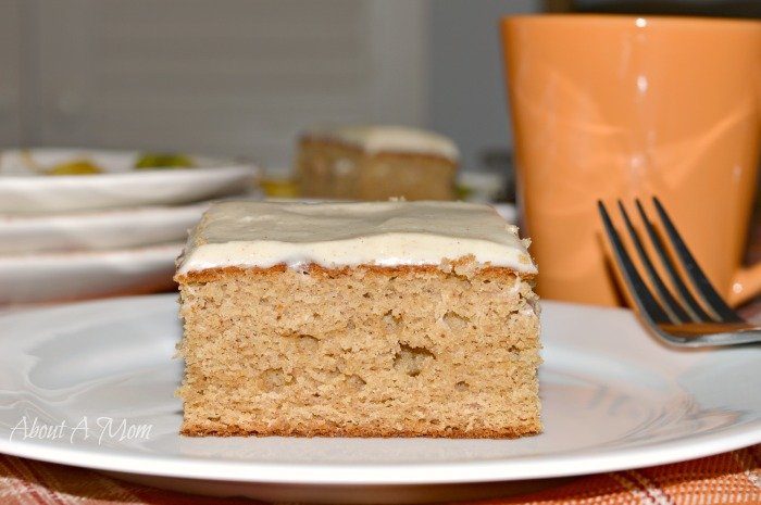 spice cake sliced on plate with fork by it 