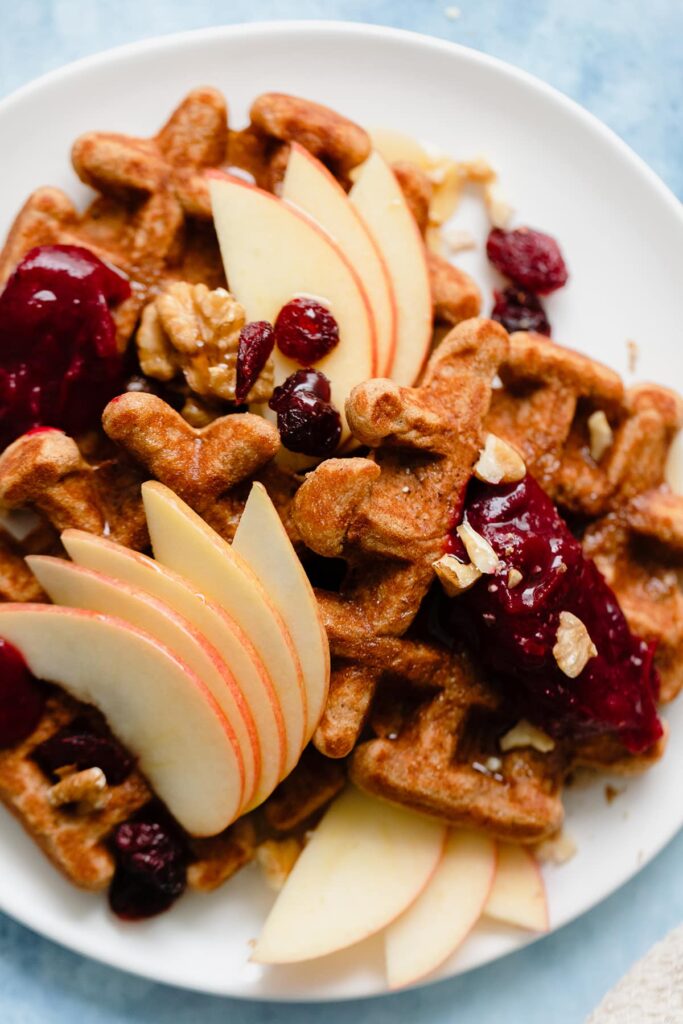 waffles with apples and toppings on 