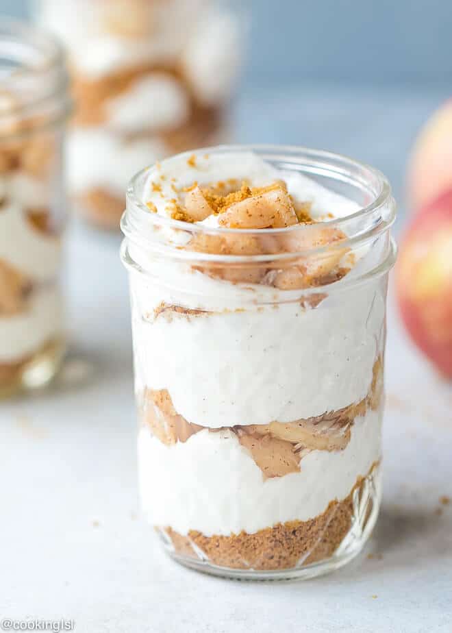 apple cheesecake mixture in a mason jar on counter 