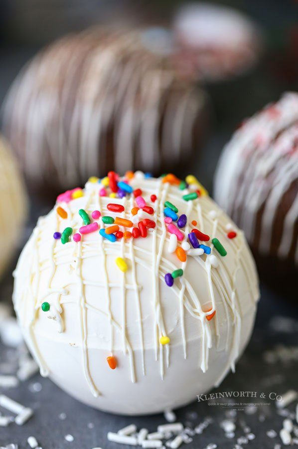 white hot chocolate ball with sprinkles 