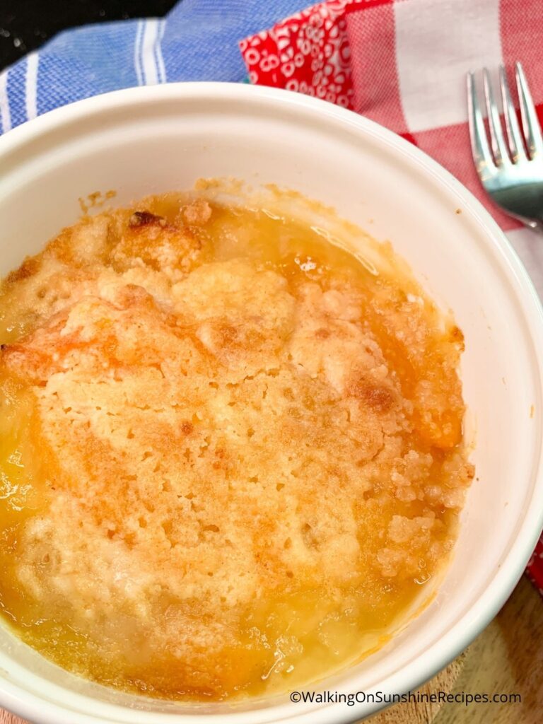 peach dump cake in a container 