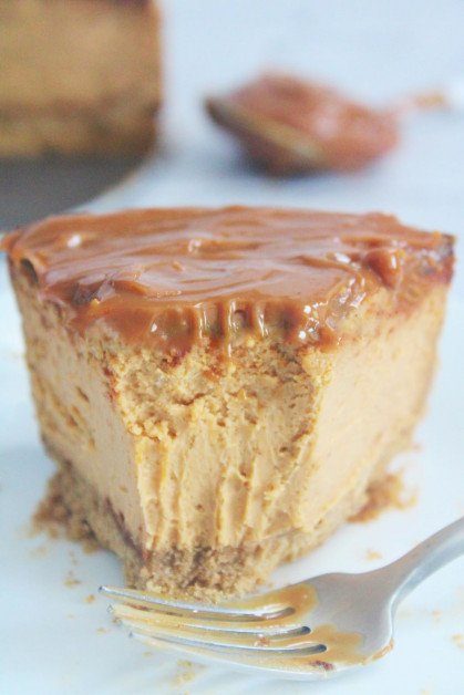 caramel cheesecake with bite taken out 