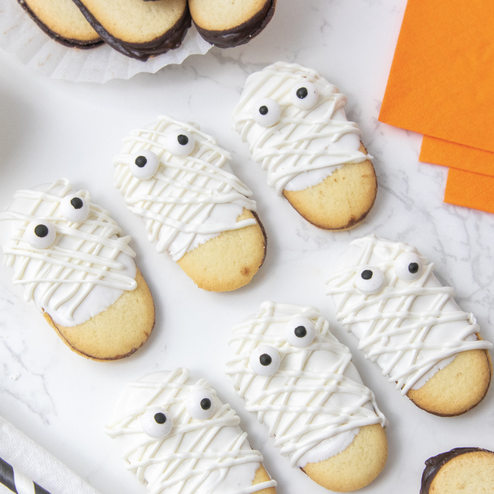 mummy cookies on a white counter
