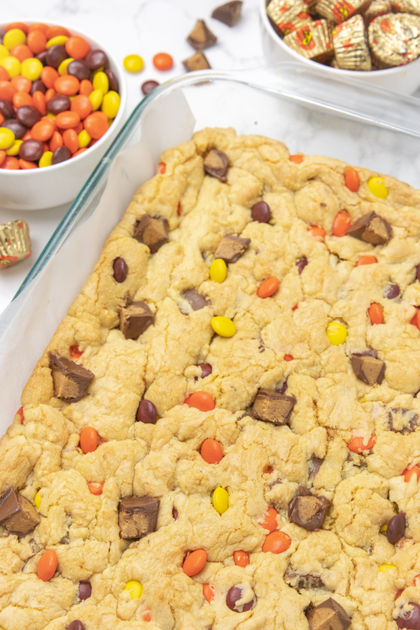 side view of cookie bars baked in a baking dish 