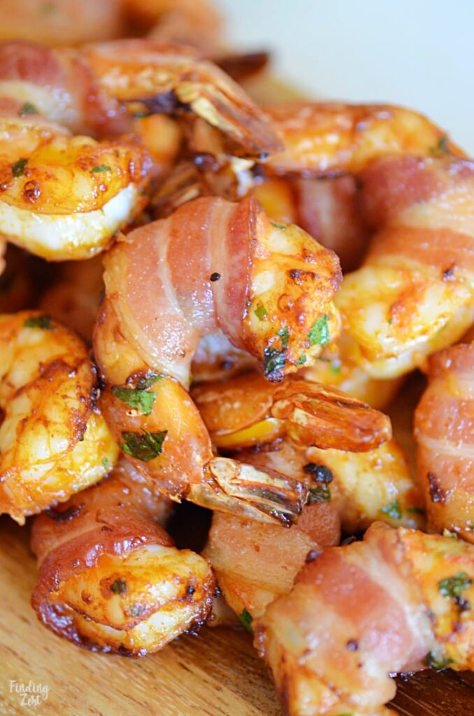 bacon wrapped shrimp on plate