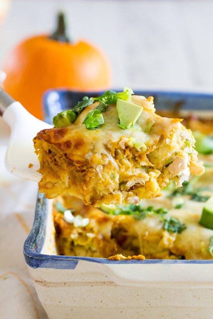 spatula with pumpkin enchilada bake on it 