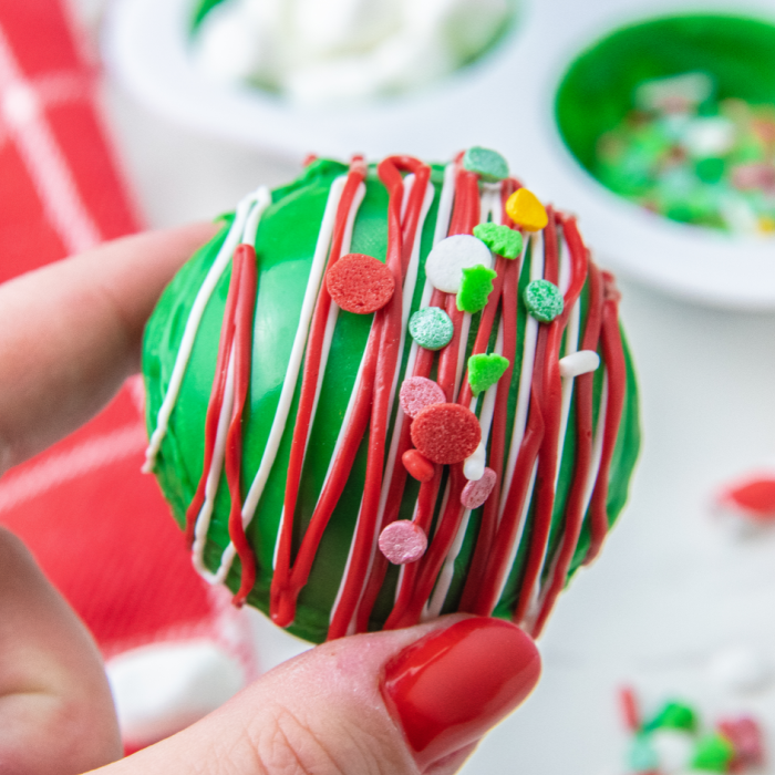 holding a Hot Chocolate Bombs