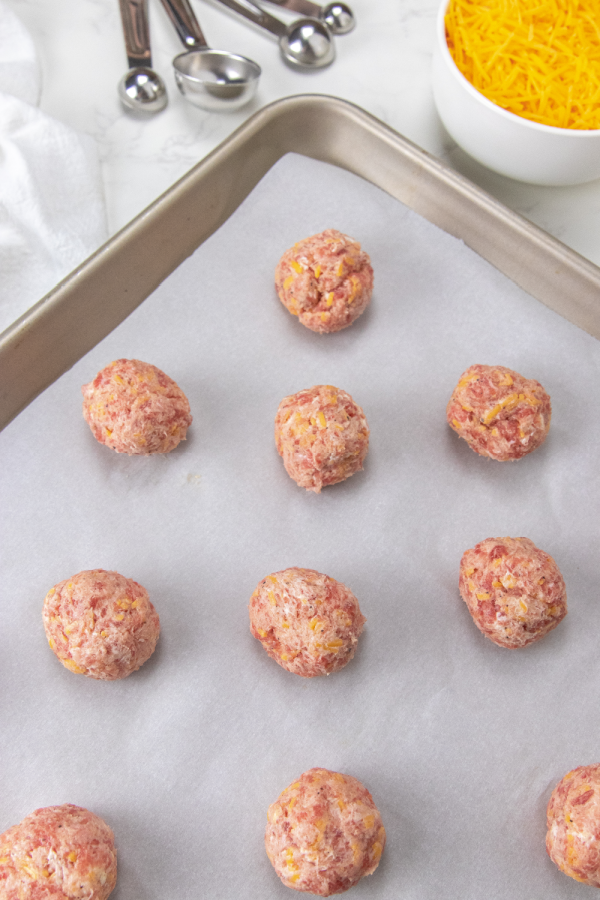sausage balls on a baking sheet 
